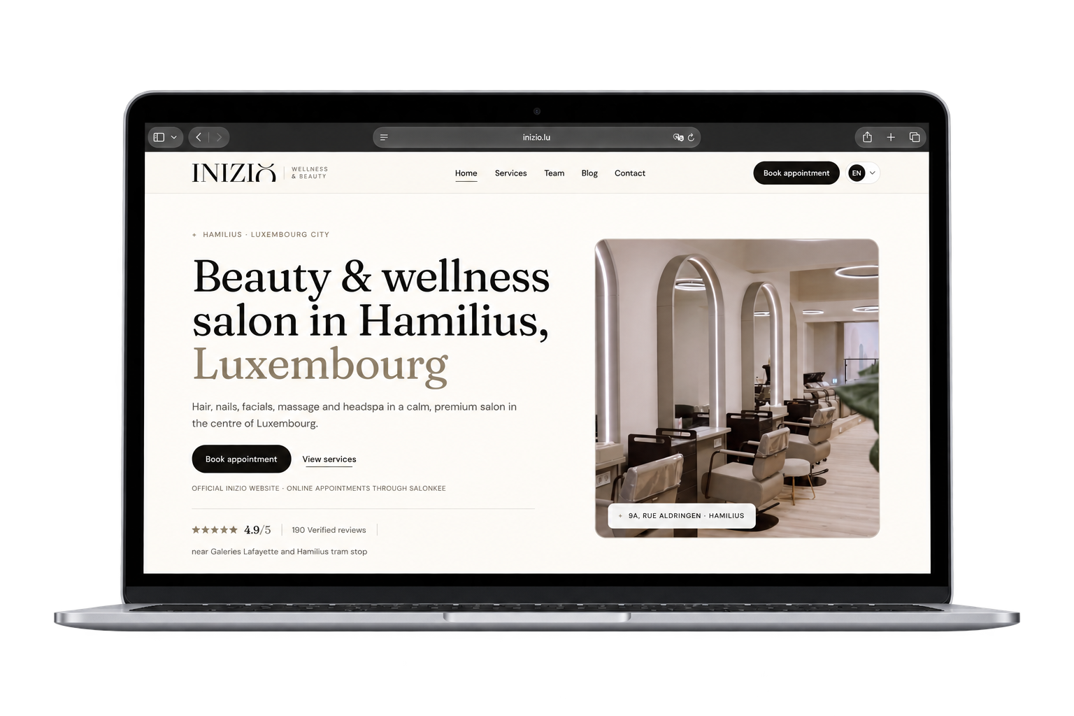 INIZIO website on a MacBook: the salon homepage and appointment booking